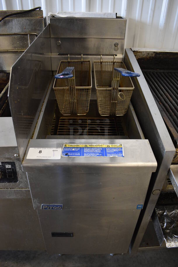 2013 Pitco Frialator SG14 Stainless Steel Commercial Natural Gas Powered Deep Fat Fryer w/ 2 Metal Fry Baskets and Left Side Splash Guard. 110,000 BTU. 15.5x34x49