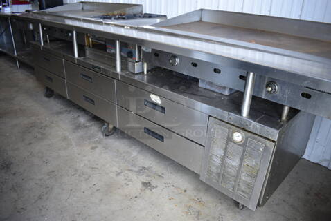 Delfield Stainless Steel Commercial 6 Drawer Chef Base on Commercial Casters. 123x36x38. Tested and Working!