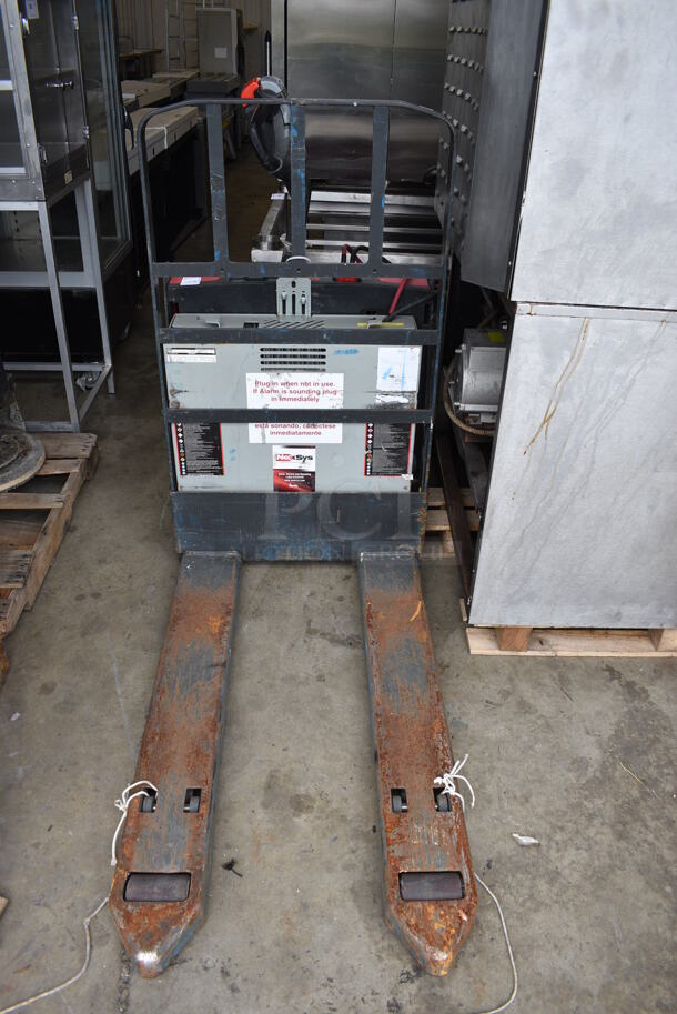 Raymond Model 8210 Metal Commercial Walkie Pallet Truck. 4,500 Pound Capacity. 29x73x51. Tested and Powers On But Shows Error Code