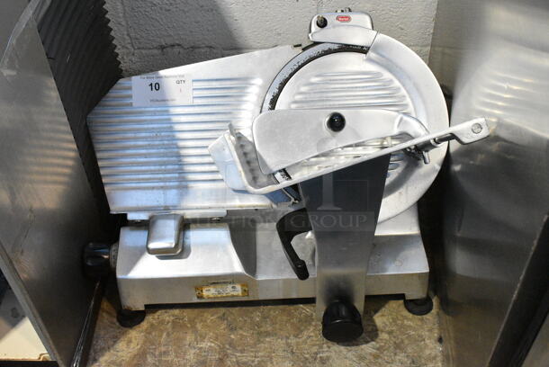 Berkel 827A Stainless Steel Commercial Countertop Meat Slicer w/ Blade Sharpener. 115 Volts, 1 Phase. Tested and Working! - Image 1 of 7