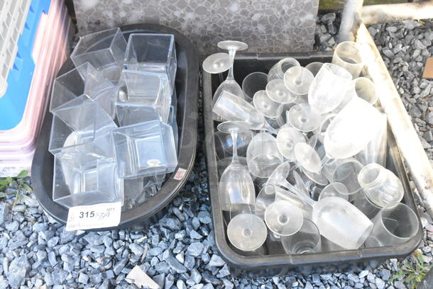 ALL ONE MONEY! Lot of 2 Bins of Various Items Including Glasses.  - Image 1 of 3