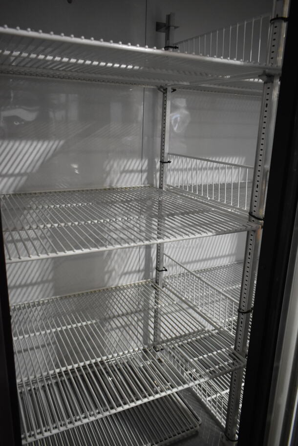 True T-72G Stainless Steel Commercial 3 Door Reach In Cooler Merchandiser w/ Poly Coated Racks on Commercial Casters. 115 Volts, 1 Phase. Tested and Working! - Image 7 of 9