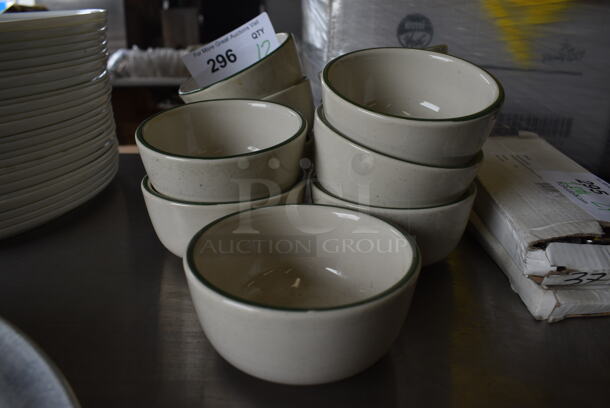 12 White Ceramic Bowls w/ Green Rim. 4.5x4.5x2. 12 Times Your Bid!