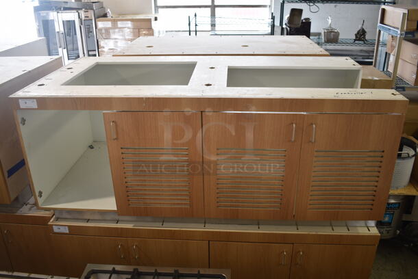 BRAND NEW! Wood Pattern 4 Door Counter. Missing Countertop and One Door. - Image 1 of 9