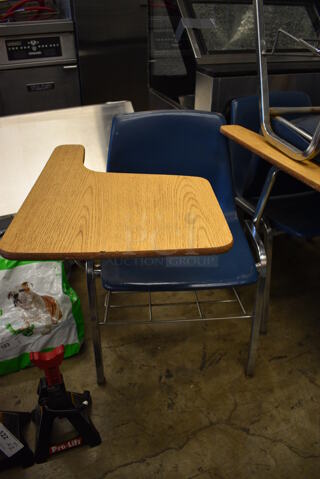 12 Blue Poly Chairs w/ Attached Wood Pattern Desktop. 25x29x28. 12 Times Your Bid!