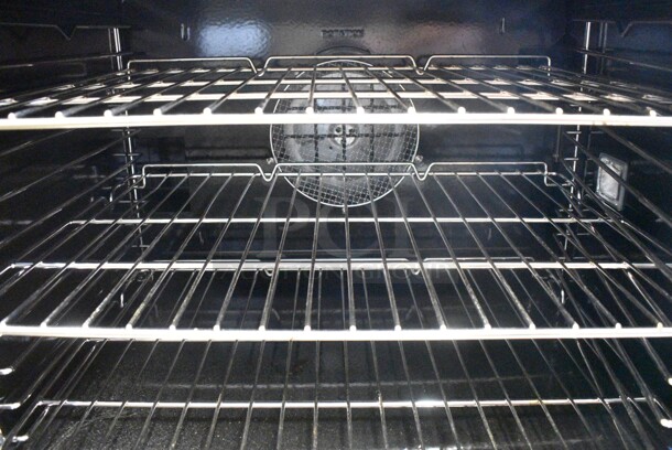BRAND NEW SCRATCH AND DENT! 2024 Cooking Performance Group CPG 351FEC100C Stainless Steel Commercial Electric Powered Full Size Convection Oven w/ View Through Doors, Metal Oven Racks, Legs and Thermostatic Controls. 208 Volts, 3 Phase.  - Image 5 of 6