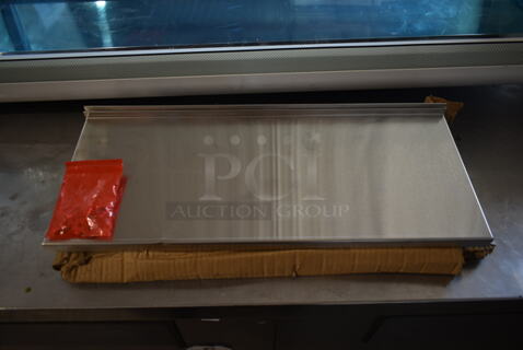 BRAND NEW IN BOX! Metal Shelf.