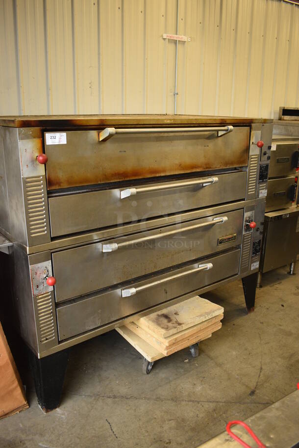 2 Garland Model GPD60 Stainless Steel Commercial Natural Gas Powered Single Deck Pizza Ovens w/ Cooking Stones on Metal Legs. 122,000. 81x49x64. 2 Times Your Bid! - Image 1 of 12