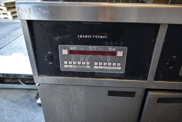 2015 Henny Penny OFG-342 Stainless Steel Commercial Floor Style Natural Gas Powered 2 Bay Deep Fat Fryer w/ Filtration System on Commercial Casters. 240,000 BTU.  - Image 7 of 11