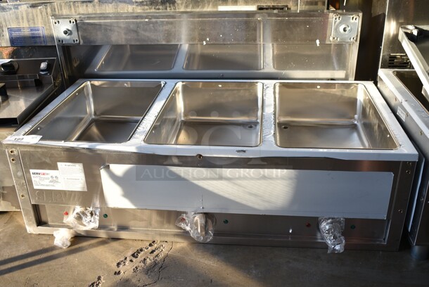 BRAND NEW SCRATCH AND DENT! 2024 ServIt 423EST3WSPB Stainless Steel Commercial Electric Powered 3 Bay Steam Table w/ Under Shelf. 120 Volts, 1 Phase. Tested and Working! - Image 2 of 8