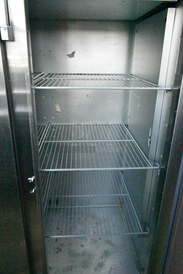 Traulsen G31010JC ENERGY STAR Stainless Steel Commercial 3 Door Reach In Freezer w/ Poly Coated Racks on Commercial Casters. 115 Volts, 1 Phase. Tested and Powers On But Does Not Get Cold
 - Image 4 of 7