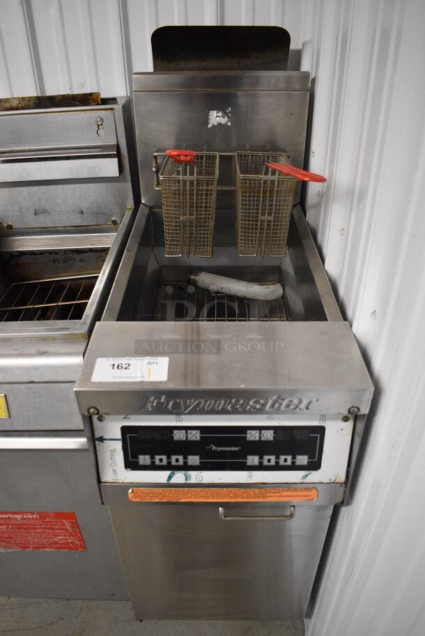 Frymaster Model MJ145ESC Stainless Steel Commercial Floor Style Natural Gas Powered Deep Fat Fryer w/ 2 Metal Fry Baskets on Commercial Casters. 122,000 BTU. 15.5x31.5x51