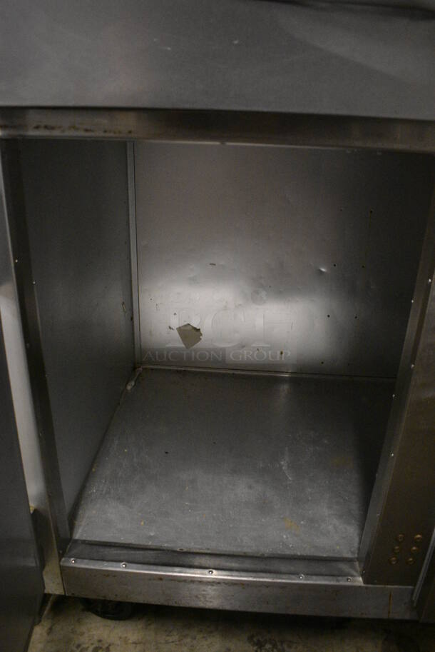 Traulsen Model G20000MC Stainless Steel Commercial 4 Half Size Door Reach In Cooler w/ Poly Coated Racks on Commercial Casters. 115 Volts, 1 Phase. 52x35x84. Tested and Working! - Image 4 of 10