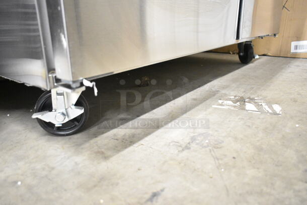 BRAND NEW SCRATCH AND DENT! 2023 Avantco 178SSPT48MHC Stainless Steel 48" 2 Door Mega Top Stainless Steel Refrigerated Sandwich Prep Table on Commercial Casters. 115 Volts, 1 Phase.  Tested and Working! - Image 7 of 8