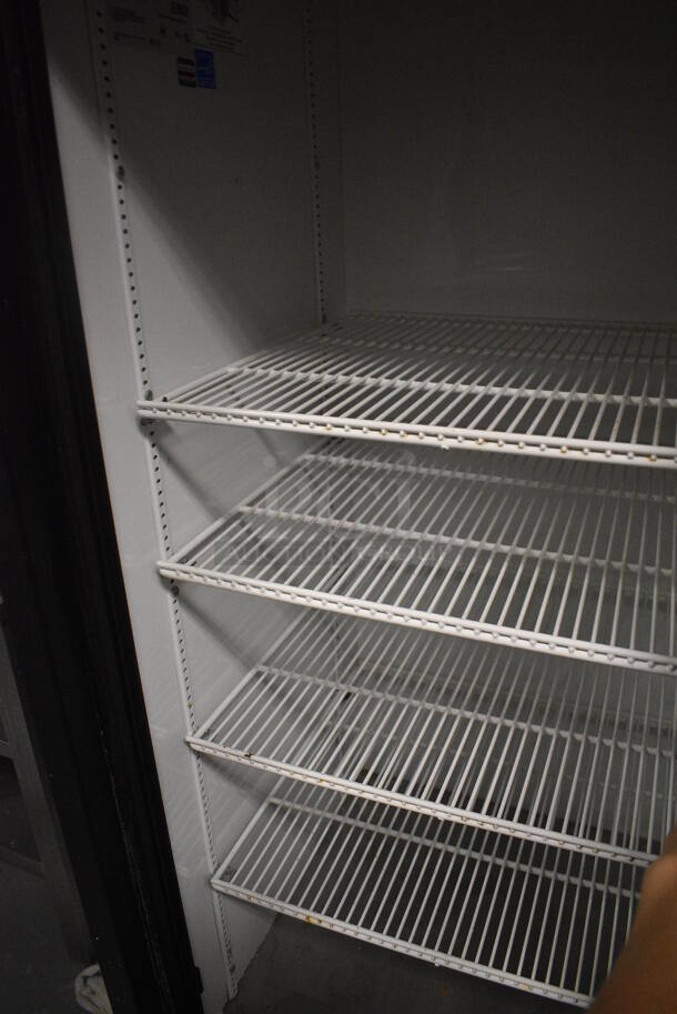 2014 True GDM-69-LD ENERGY STAR Metal Commercial 3 Door Reach In Cooler Merchandiser w/ Poly Coated Racks. 115 Volts, 1 Phase. 78.5x30x78.5. Item Was in Working Condition on Last Day of Business. (kitchen) - Image 5 of 7