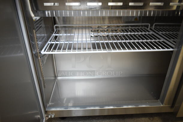 BRAND NEW SCRATCH AND DENT! 2023 Avantco 178SSPT60MHC  60" 2 Door Mega Top Stainless Steel Refrigerated Sandwich Prep Table on Commercial Casters. 115 Volts, 1 Phase. Tested and Working! - Image 8 of 9