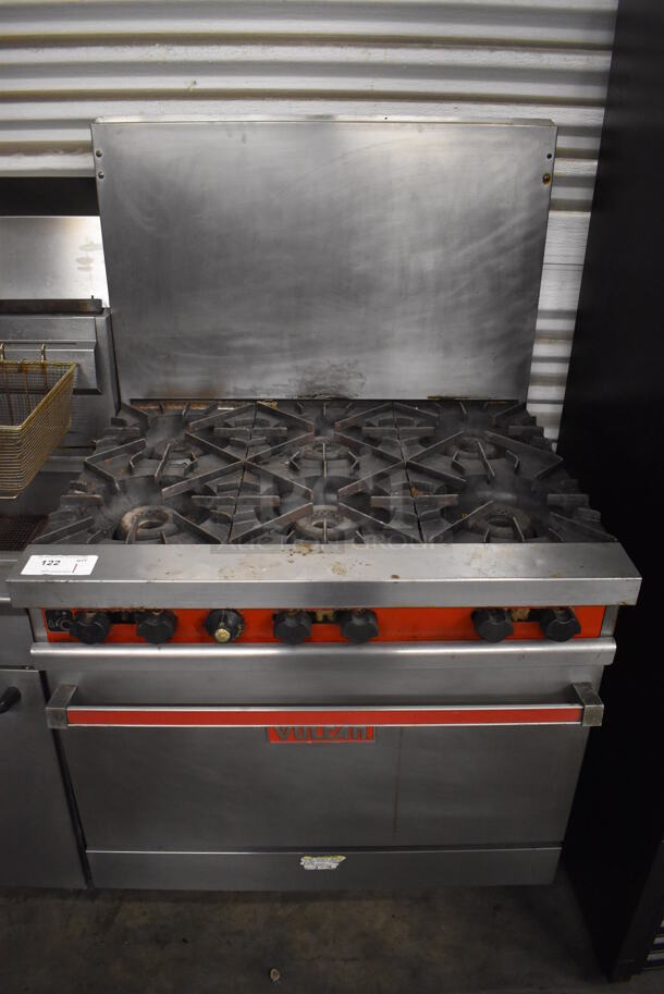 Vulcan Stainless Steel Commercial Natural Gas Powered 6 Burner Range w/ Oven, Over Shelf and Backsplash. 36x30x60
