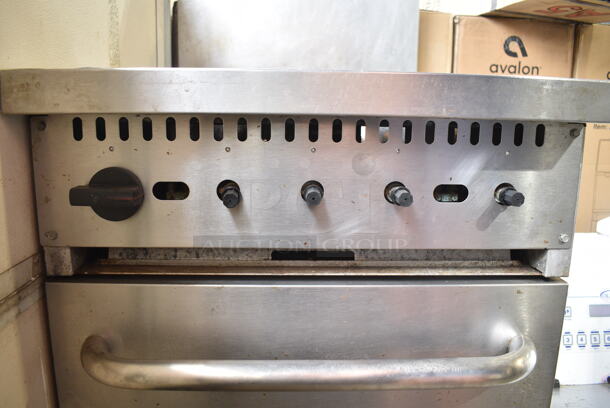 Cooking Performance Group CPG 351S24N Stainless Steel Commercial Natural Gas Powered 4 Burner Range w/ Oven and Back Splash on Commercial Casters. 150,000 BTU.  - Image 4 of 6