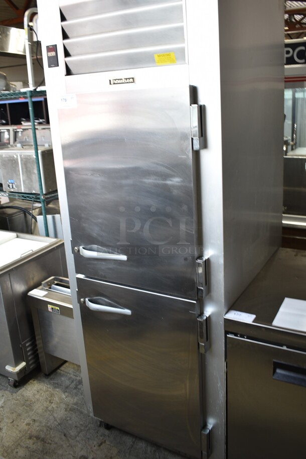 2016 Traulsen G12000 Stainless Steel Commercial 2 Half Size Door Reach In Cooler w/ Poly Coated Racks on Commercial Casters. 115 Volts, 1 Phase. Tested and Powers On But Does Not Get Cold
 - Image 1 of 5