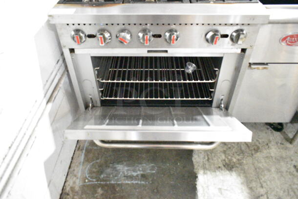 Cooking Performance Group CPG 351S36N Stainless Steel Commercial Natural Gas Powered 6 Burner Range w/ Oven, Over Shelf and Back Splash on Commercial Casters. 210,000 BTU.  - Image 5 of 7