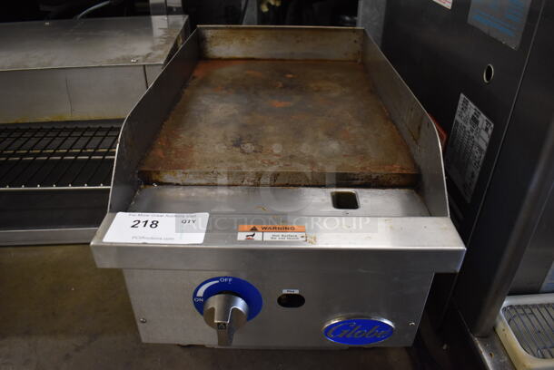 Globe Stainless Steel Commercial Countertop Natural Gas Powered Flat Top Griddle. 15x29x13