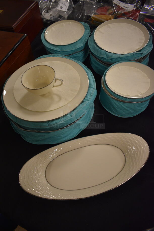 ALL ONE MONEY! Lot of Lenox Dinnerware Including Serving Plate, Cups, Dinner Plates, Salad Plates, Bread and Butter Plates, and Saucers With Protective Covers  - Image 1 of 12