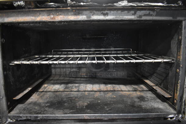 Imperial Stainless Steel Commercial Natural Gas Powered 4 Burner Range w/ Flat Top Griddle, 2 Ovens, Over Shelf and Back Splash on Commercial Casters. 60x32x55 - Image 8 of 9
