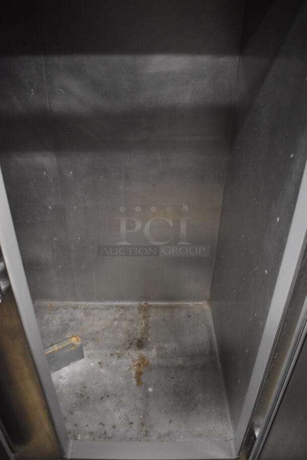 Continental 2RE Stainless Steel Commercial 2 Door Reach In Cooler on Commercial Casters. 115 Volts, 1 Phase. 57x34x82. Tested and Working! - Image 5 of 6