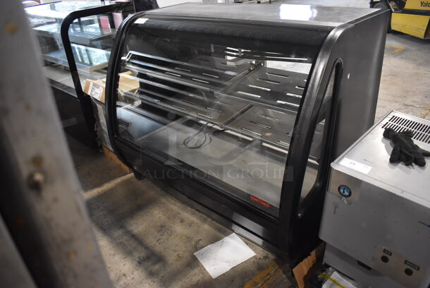 2011 Model Torrey TEM150N-ULH Commercial Floor Style Electric Powered Glass Front in Black With Stainless Steel Adjustable Shelves Deli Case Model. 127V. Tested And Powers On But Does Not Get Cold