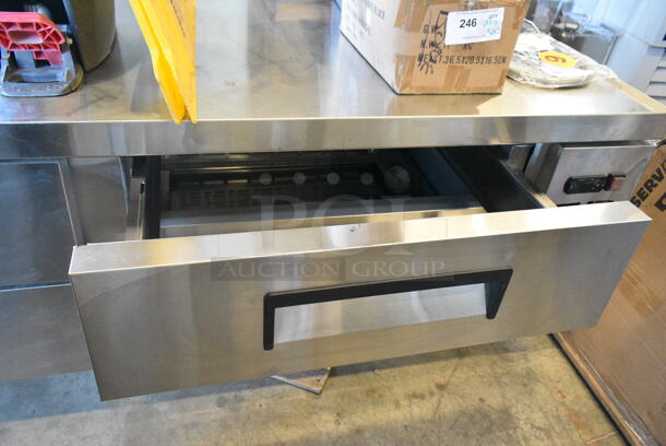 BRAND NEW SCRATCH AND DENT! 2023 Avantco 178CBE84HC Stainless Steel Commercial 4 Drawer Refrigerated Chef Base on Commercial Casters. 115 Volts, 1 Phase. Tested and Working! - Image 8 of 10
