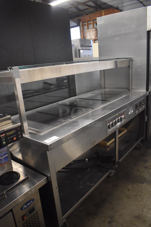 Wells Stainless Steel Commercial Warming Prep Station w. Under Shelf and Sneeze Guard on Commercial Casters. 240 Volts, 3 Phase. 79x33x57
