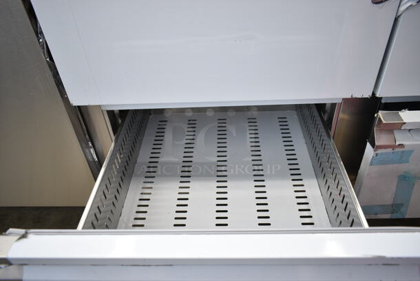 BRAND NEW SCRATCH AND DENT! 2023 Avantco 178SSUD3R Stainless Steel Commercial Undercounter Cooler w/ Door and 4 Drawers on Commercial Casters. 115 Volts, 1 Phase. Tested and Powers On But Does Not Get Cold - Image 6 of 11