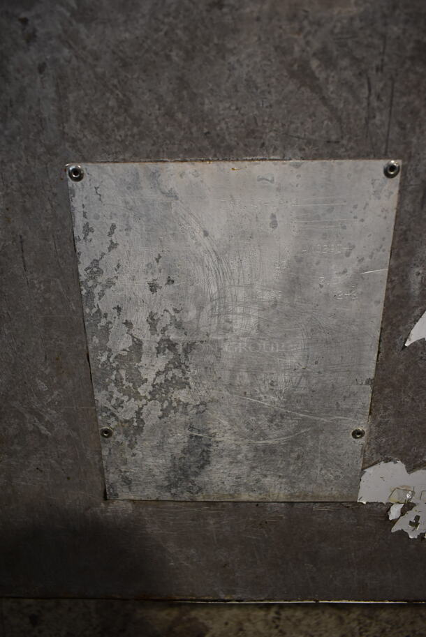 Henny Penny CG-303 Stainless Steel Commercial Floor Style  Natural Gas Powered 3 Bay Deep Fat Fryer w/ 3 Lids and 4 Metal Fry Baskets on Commercial Casters. 240,000 BTU. - Image 5 of 10