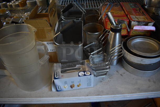ALL ONE MONEY! Lot of Tabletop Lot of Various Items Including Dishes, Trash Can, Poly Bins, Metal Baking Pans and Metal Baskets. Does Not Include Table. - Image 7 of 10