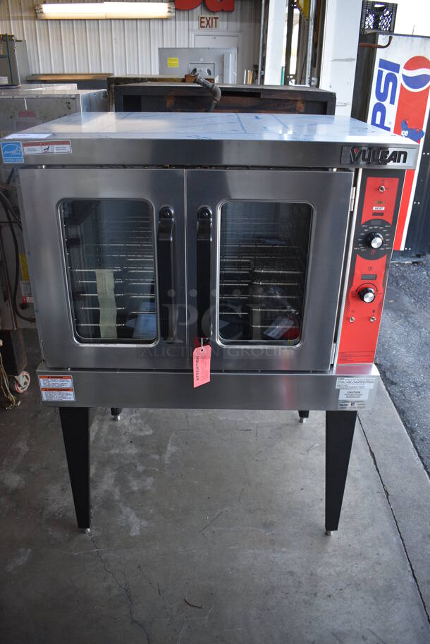BRAND NEW SCRATCH AND DENT! LATE MODEL! Vulcan Model VC5GD-11D1Z Stainless Steel Commercial Natural Gas Powered Full Size Convection Oven w/ View Through Doors, Metal Oven Racks and Thermostatic Controls on Metal Legs. 40x32x55. Tested and Working!