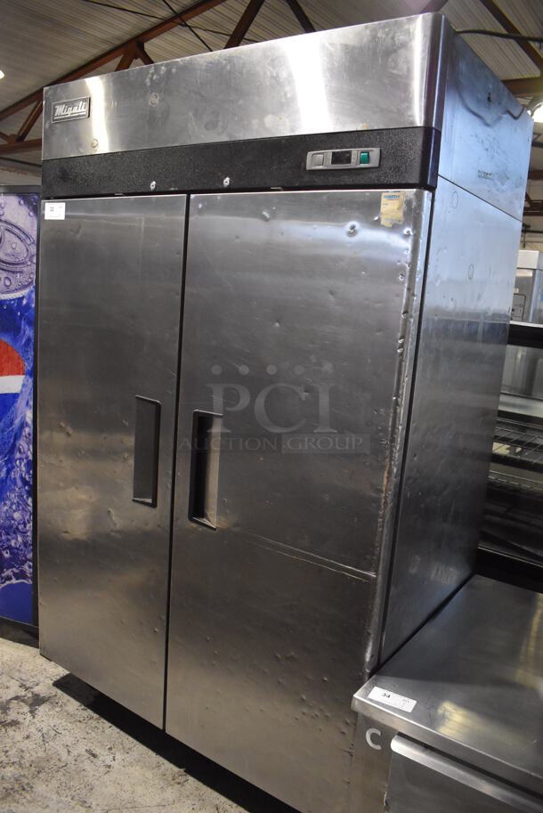 2015 Migali C-2F Stainless Steel Commercial 2 Door Reach In Cooler w/ Poly Coated Racks on Commercial Casters. 115 Volts, 1 Phase. 51x31.5x82.5. Tested and Working!
