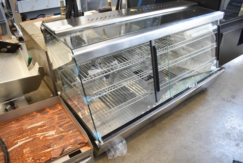 BRAND NEW SCRATCH AND DENT! ServIt 423HDM48SA Stainless Steel Commercial 48" Self / Full Service 3 Shelf Countertop Heated Display Case with Sliding Doors. See Pictures For Broken Glass. 120 Volts, 1 Phase. Tested and Working!