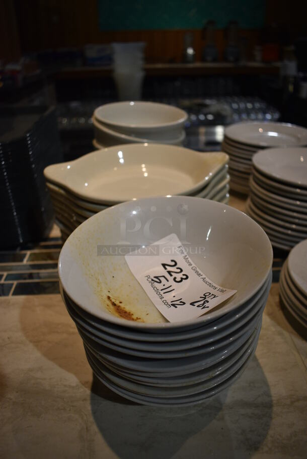 ALL ONE MONEY! Lot of 28 Ceramic Dishes Including Bowls and Single Serving Casserole Dishes. Includes 6x6x2. (bar)