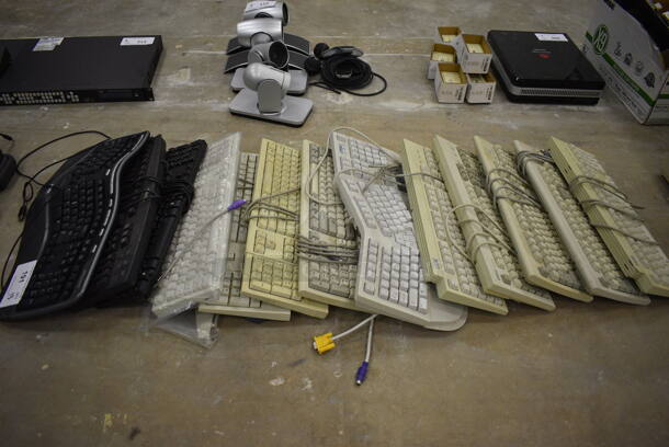 13 Keyboards in Various Colors. 13 Times Your Bid! (Main Building)