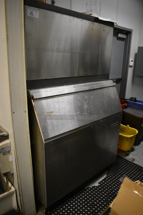 Scotsman CME1356WS-32F Stainless Steel Commercial Ice Head on Scotsman Metal Commercial Ice Bin. 208/230 Volts, 1 Phase. 48x34x78. BUYER MUST REMOVE. Item Was in Working Condition on Last Day of Business. (kitchen)