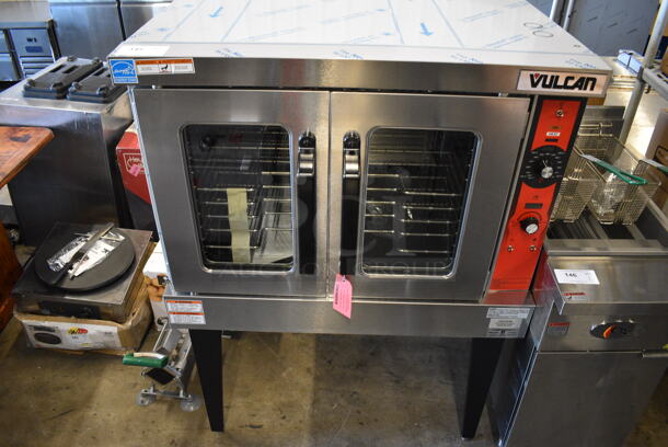 BRAND NEW SCRATCH AND DENT! LATE MODEL! Vulcan Model VC5GD-11D1Z Stainless Steel Commercial Natural Gas Powered Full Size Convection Oven w/ View Through Doors, Metal Oven Racks and Thermostatic Controls on Metal Legs. 40x32x55. Tested and Working!