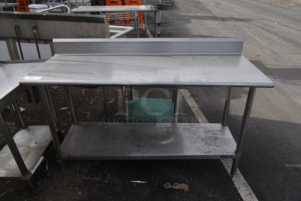 Stainless Steel Commercial Table w/ Back Splash and Under Shelf. - Image 1 of 3