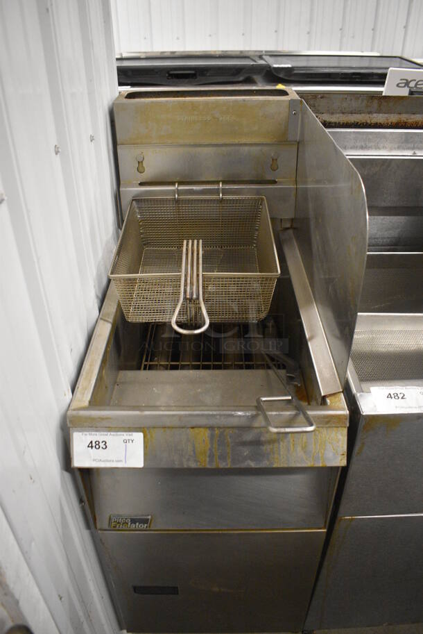 Pitco Frialator Model 14RS Stainless Steel Commercial Floor Style Natural Gas Powered Deep Fat Fryer w/ Right Side Splash Guard and Basket on Commercial Casters. 16x31.5x47