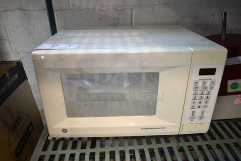 General Electric GE JES1039WJ02 Metal Countertop Microwave Oven. 120 Volts, 1 Phase. 