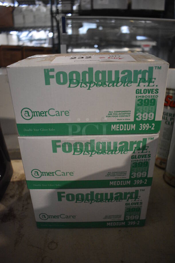 3 Boxes of BRAND NEW AmerCare Foodguard Disposable PE Medium Gloves. 3 Times Your Bid!