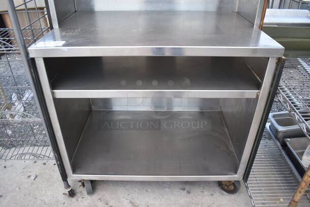 Stainless Steel Commercial Table w/ 2 Under Shelves and 2 Over Shelves on Commercial Casters. 36x24x55 - Image 4 of 5