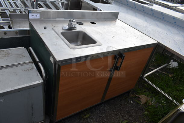 Duke Stainless Steel Commercial Counter w/ Sink Bay, Faucet, Handle, Back Splash and 2 Wood Pattern Doors. - Image 1 of 6