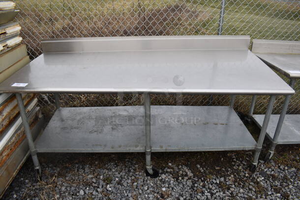 Stainless Steel Table w/ Back Splash and Under Shelf on Commercial Casters. 84x36x42