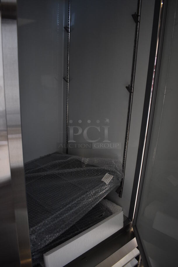 BRAND NEW SCRATCH AND DENT! Avantco Model 178A49RHC Stainless Steel Commercial 2 Door Reach In Cooler w/ Poly Coated Racks on Commercial Casters. 115 Volts, 1 Phase. 53x32.5x82.5. Tested and Working! - Image 3 of 5