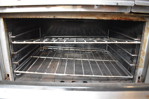 Garland Stainless Steel Commercial Natural Gas Powered 10 Burner Range w/ 2 Ovens, Cheese Melter, Over Shelf and Back Splash. 60x33x68 - Image 7 of 8